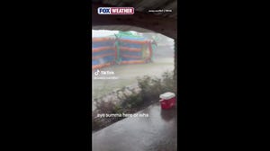Powerful winds send a bounce house tumbling in Florida