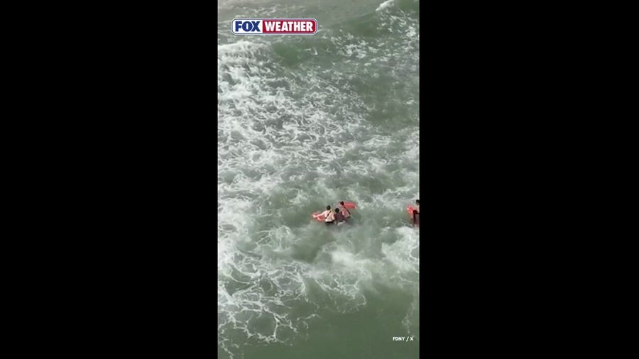 Floatation deployed from drone keeps swimmers afloat before rescuers could assist them safely to New York City beach