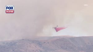 CalFire air tanker fights wildfire on U.S. Military Base