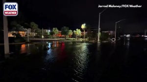Storm surge covers roads in Fort Walton Beach, Florida, after Isaias landfall