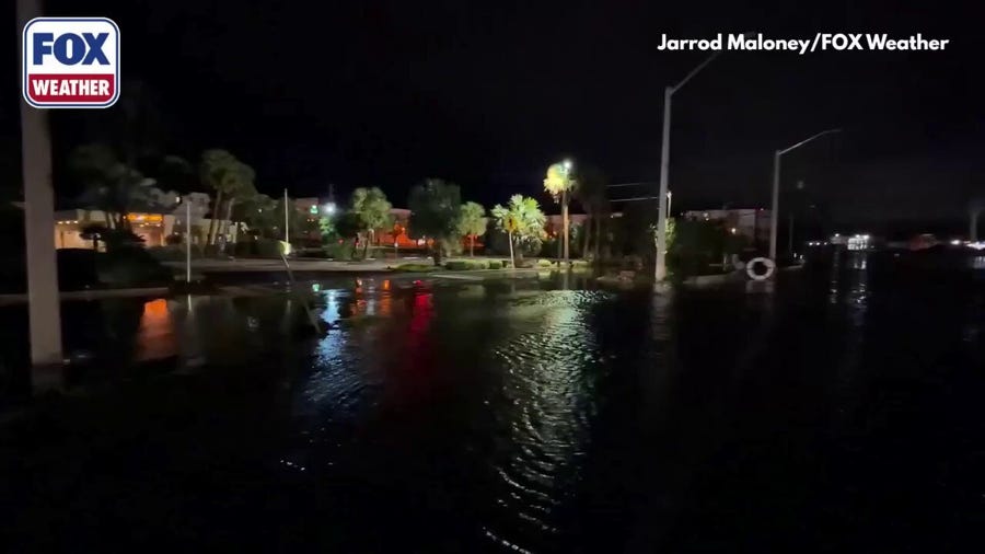 Storm surge covers roads in Fort Walton Beach, Florida, after Isaias landfall