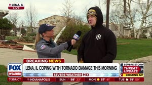 The sun comes up over tornado damage in Illinois