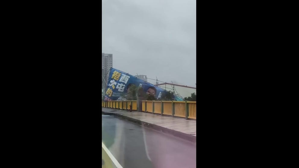 Powerful winds sent a sign crashing down in Taichung as Champi neared the island Friday, prompting sea and land typhoon warnings and hundreds of flight cancellations. Credit: @bearcat711 via Storyful