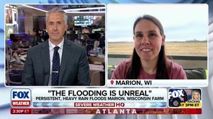 Farm owner details clean up after heavy rain swamps areas in Wisconsin