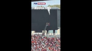 Skydiver rescued after crashing into scoreboard at Virginia Tech spring football game