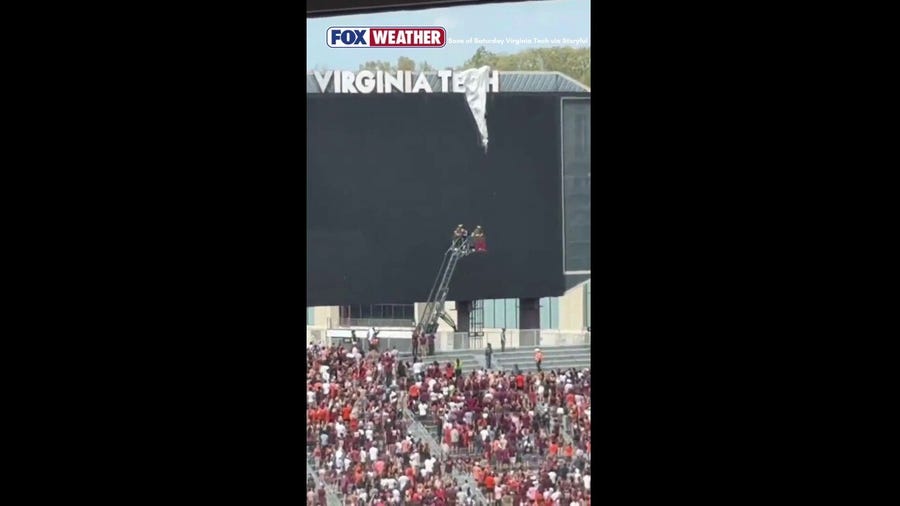 Skydiver rescued after crashing into scoreboard at Virginia Tech spring football game