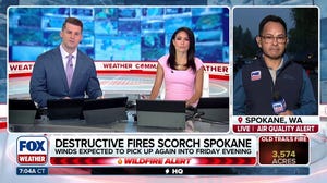 Charred aftermath in Spokane, Washington, after wildfires torch landscape