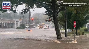 Bus driver plows through significant flash flooding in Connecticut