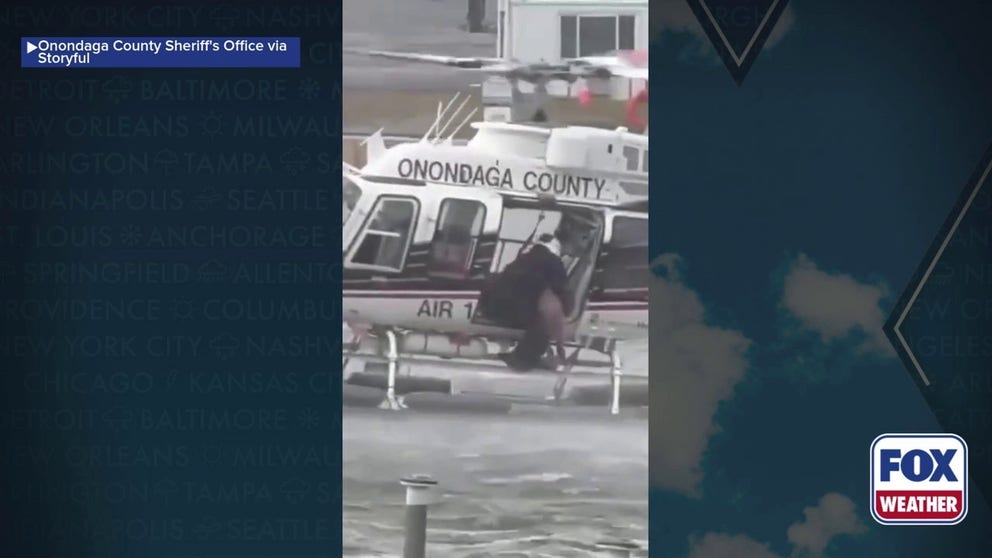 A goldendoodle was pulled from the frigid Seneca River after struggling to stay afloat Monday. Officials carried out a skid rescue and rushed the trembling pup to safety, where firefighters were waiting with blankets.