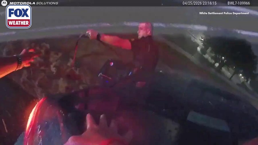 Mother, two children rescued after car swept into floodwaters