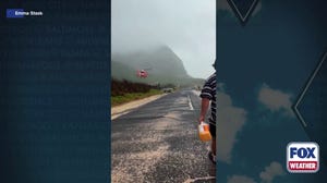 Watch: Couple stranded on Hawaii beach during flooded rescued after 24 hours 