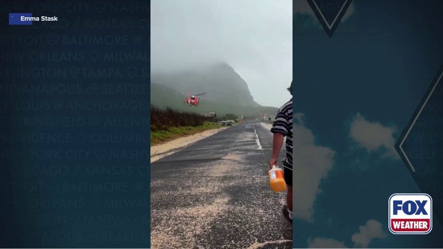 Watch: Couple stranded on Hawaii beach during flooded rescued after 24 hours