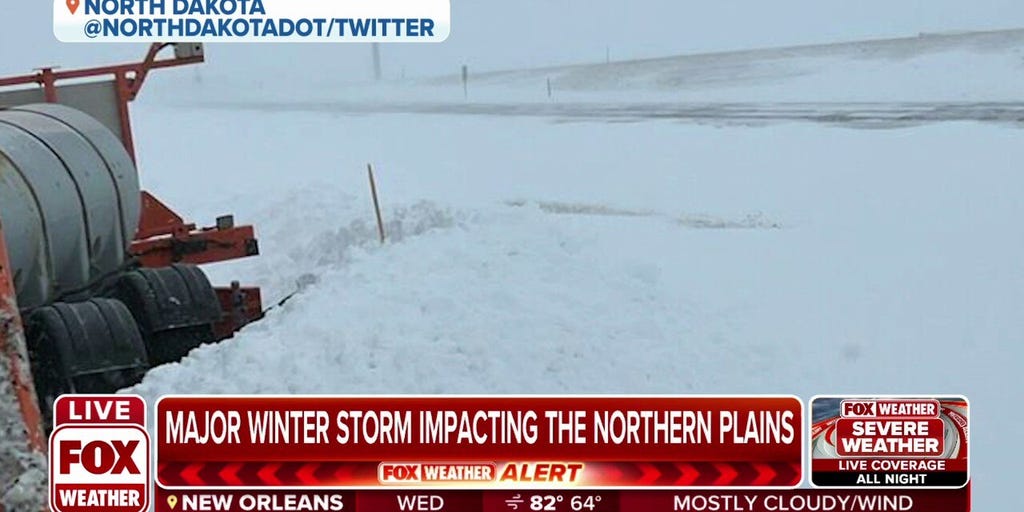 Historic blizzard covers roads with snow in North Dakota Latest