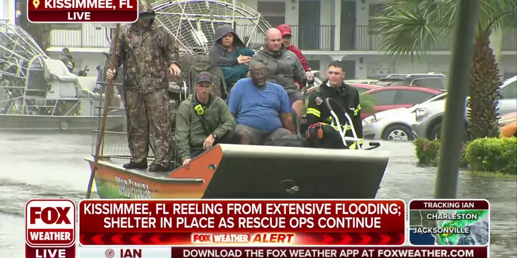 Water rescues underway in Kissimmee, Florida as Ian moves through the