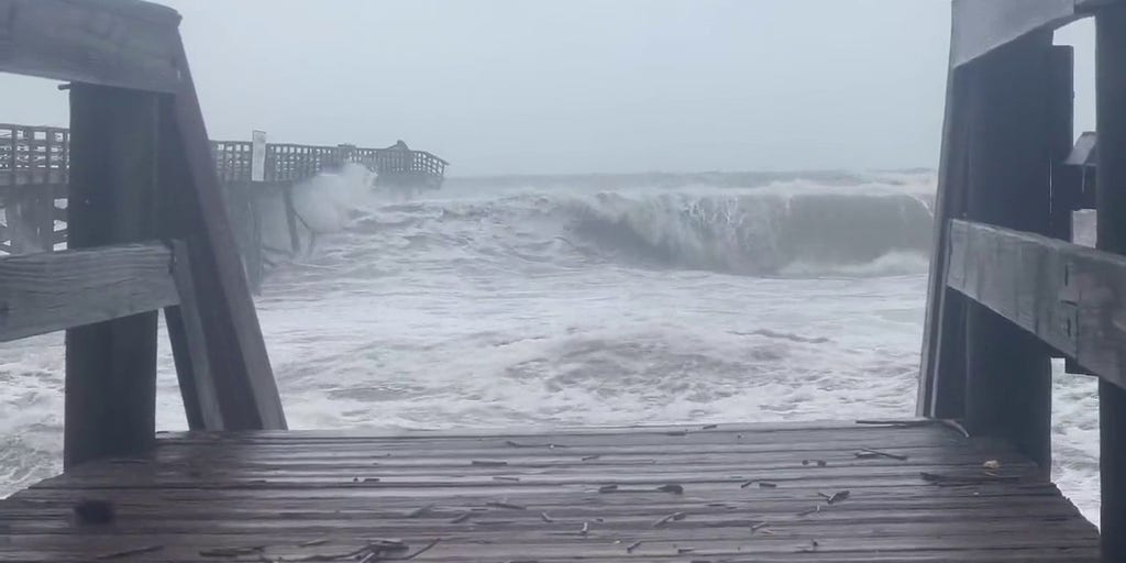 Flagler Beach pier takes on Tropical Storm Nicole after damage from ...