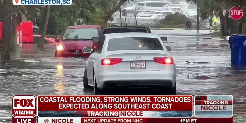 Coastal flooding due to Nicole stranding cars in Charleston, South