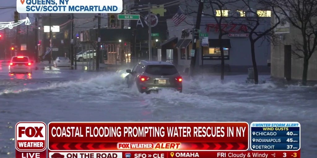 Queens, New York experiencing coastal flooding leading to water rescues