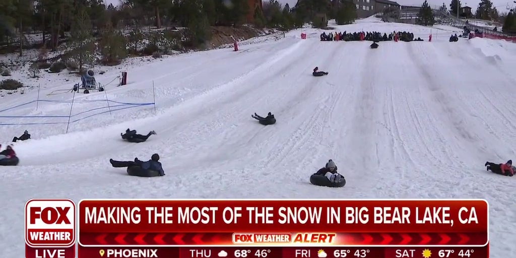 Snow enthusiasts winter storm in Big Bear Lake, California