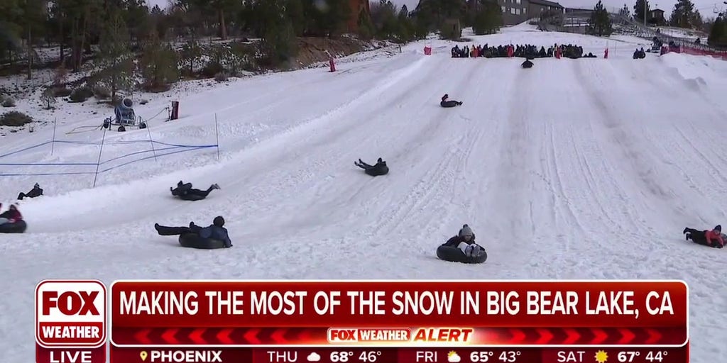 Snow enthusiasts winter storm in Big Bear Lake, California Snow enthusiasts winter storm in Big Bear Lake, California