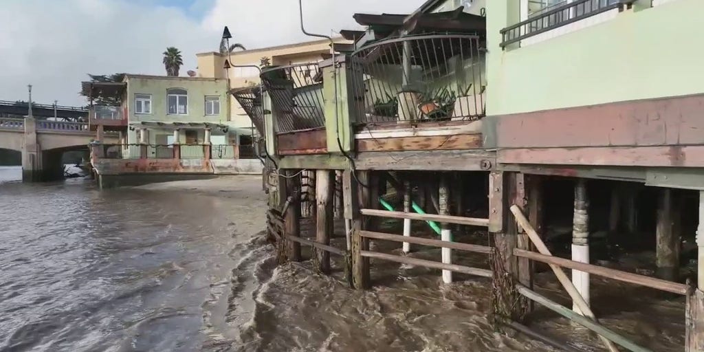 Drone video shows devastating damage to buildings from bomb cyclone in