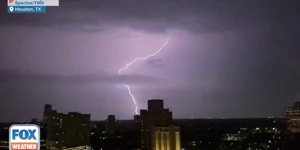 Houston+Aglow+as+Epic+Lightning+Storm+Illuminates+Skyline