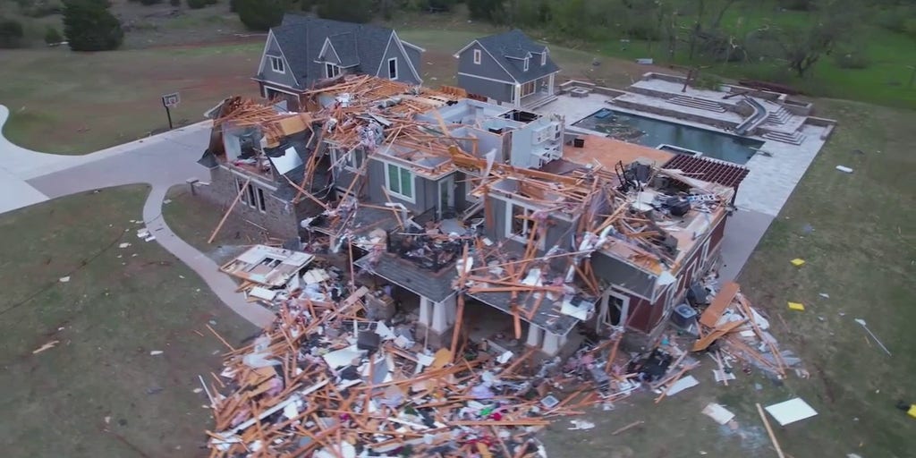 Drone video shows homes flattened, cars tossed from deadly tornado in