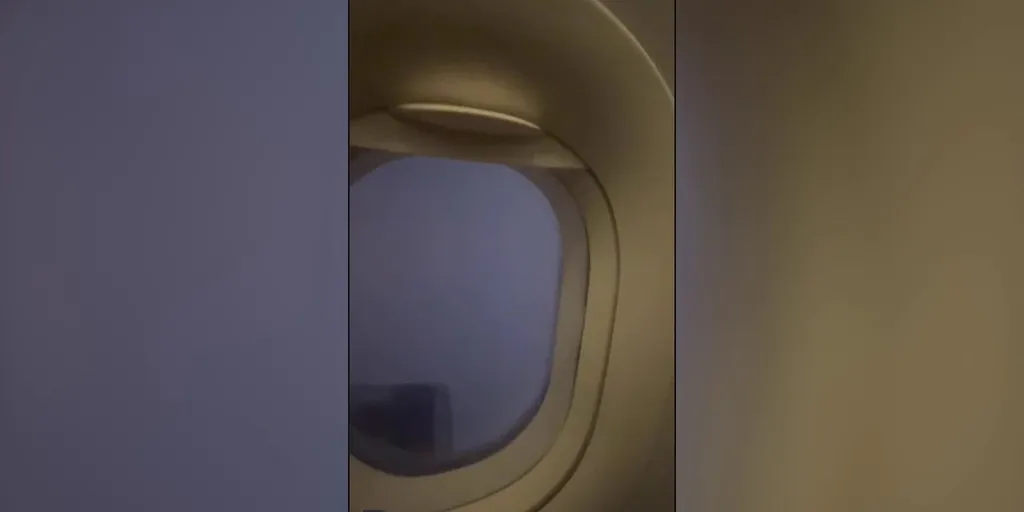Watch Vivid lightning flashes outside airplane during turbulent flight