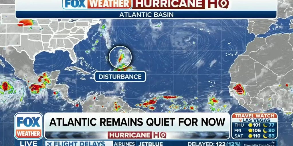 Tropical disturbance spinning south of Bermuda has low chance of