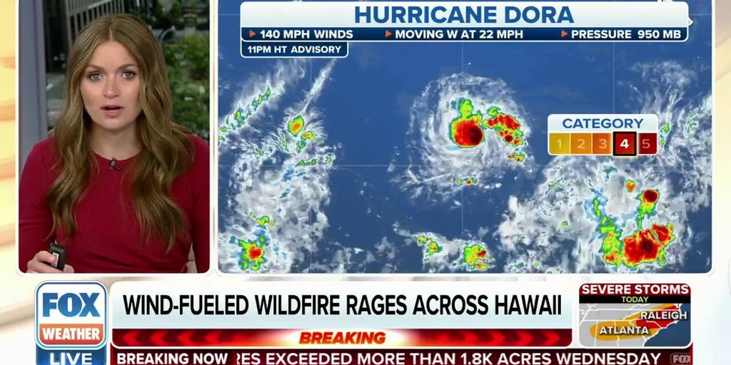 Hurricane Dora continues to trek westward in open Pacific Ocean