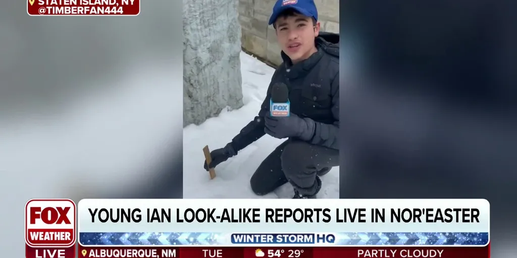 Young Ian Oliver lookalike reports live during nor'easter Latest