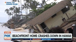 Hawaii home crashes into beach after erosion, powerful ocean swells