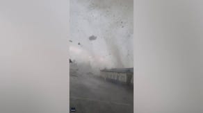 Watch: Couple barely escapes deadly EF-3 tornado