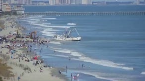 Full time-lapse of crews freeing beached boat from Myrtle Beach