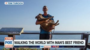 Man and dog travel the world together on foot