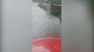 Monsoon rainfall turns Santa Fe, New Mexico streets into rivers