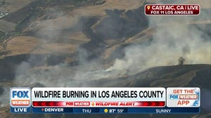 Los Angeles County brush fire threatens several structures