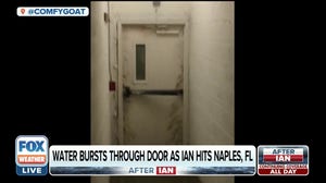 Watch as water bursts through door of Naples building during Hurricane Ian