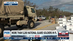 National Guard distributing food, supplies to residents stranded by floodwaters