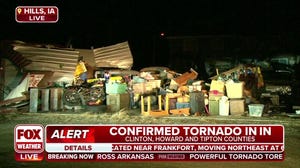Tornado damages structures in Hills, Iowa