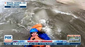 Watch: Woman rescued from rapids after being thrown from raft