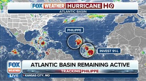 Invest 91L sees chances of development increase while Philippe remains disorganized in the Atlantic