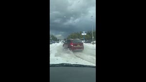 Watch: New Mexico cars drive through rivers of hail