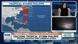 Tropical Storm Philippe continues north