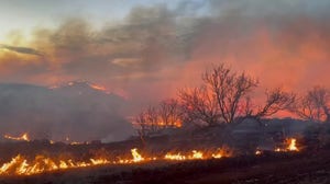 Brushfire flames spread in North Texas during critical fire weather