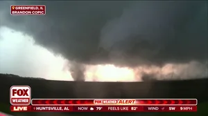 Twisters spin through Illinois as storms tear across Midwest