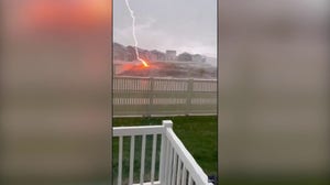 Woman captures spectacular lightning strike close to Utah home