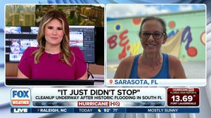 Sarasota, Florida business owner trapped by floodwaters