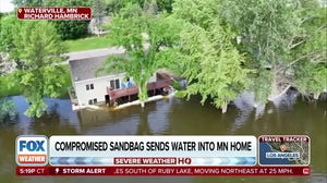 Minnesota homeowner blacks out when flood water breaches sandbag barricades