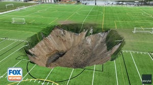 Massive sinkhole opens at soccer field in Alton, Illinois