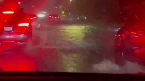 Watch: Cars drive through flooding on Massachusetts highway outside Boston